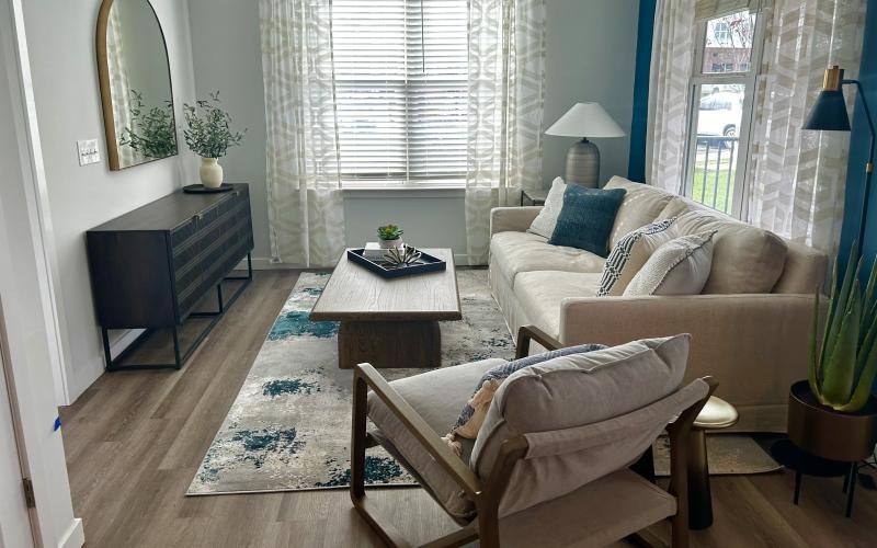 a living room with a couch and a table